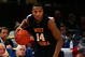 NEW YORK - MARCH 13: Darris Nichols #14 of the West Virginia Mountaineers handles the ball against the Connecticut Huskies during day two of the 2008 Big East Men's Basketball Championship at Madison Square Garden on March 13, 2008 in New York City. (Photo by Jim McIsaac/Getty Images)