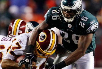 LANDOVER, MD - OCTOBER 26:  Quarterback Jason Campbell #17 of the Washington Redskins avoids a sack by Sean Jones #26 of the Philadelphia Eagles during fourth quarter action at FedEx Field October 26, 2009 in Landover, Maryland. The Eagles won the game 27-17.  (Photo by Win McNamee/Getty Images)