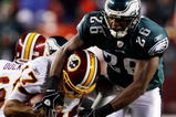 LANDOVER, MD - OCTOBER 26:  Quarterback Jason Campbell #17 of the Washington Redskins avoids a sack by Sean Jones #26 of the Philadelphia Eagles during fourth quarter action at FedEx Field October 26, 2009 in Landover, Maryland. The Eagles won the game 27-17.  (Photo by Win McNamee/Getty Images)
