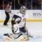 UNIONDALE, NY - OCTOBER 31:  Ryan Miller #30 of the Buffalo Sabres makes a save against the New York Islanders on October 31, 2009 at Nassau Coliseum in Uniondale, New York.  (Photo by Jim McIsaac/Getty Images)