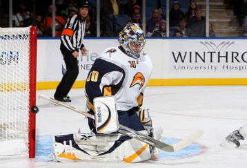 UNIONDALE, NY - OCTOBER 31:  Ryan Miller #30 of the Buffalo Sabres makes a save against the New York Islanders on October 31, 2009 at Nassau Coliseum in Uniondale, New York.  (Photo by Jim McIsaac/Getty Images)