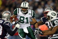 FOXBORO, MA - NOVEMBER 13:  Dustin Keller #81 of the New York Jets weaves past Jason Webster #23 of the New England Patriots on November 13, 2008 at Gillette Stadium in Foxboro, Massachusetts.  (Photo by Elsa/Getty Images)