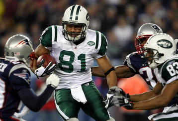 FOXBORO, MA - NOVEMBER 13:  Dustin Keller #81 of the New York Jets weaves past Jason Webster #23 of the New England Patriots on November 13, 2008 at Gillette Stadium in Foxboro, Massachusetts.  (Photo by Elsa/Getty Images)