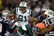 FOXBORO, MA - NOVEMBER 13:  Dustin Keller #81 of the New York Jets weaves past Jason Webster #23 of the New England Patriots on November 13, 2008 at Gillette Stadium in Foxboro, Massachusetts.  (Photo by Elsa/Getty Images)