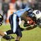 NASHVILLE, TN - NOVEMBER 01:  Chris Johnson #28 of the Tennessee Titans hits Brian Russell #26 of the Jacksonville Jaguars during their game at LP Field on November 1, 2009 in Nashville, Tennessee.  (Photo by Streeter Lecka/Getty Images)