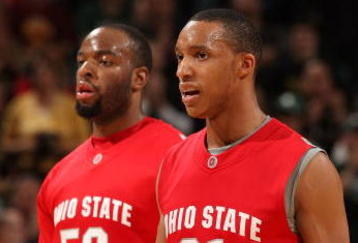 INDIANAPOLIS - MARCH 15:  Evan Turner #21 (R) and Dallas Lauderdale #52 of the Ohio State Buckeyes walk towards the bench against the Purdue Boilermakers during the final of the Big Ten Men's Basketball Tournament at Conseco Fieldhouse on March 15, 2009 in Indianapolis, Indiana.  (Photo by Jonathan Daniel/Getty Images)
