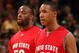 INDIANAPOLIS - MARCH 15:  Evan Turner #21 (R) and Dallas Lauderdale #52 of the Ohio State Buckeyes walk towards the bench against the Purdue Boilermakers during the final of the Big Ten Men's Basketball Tournament at Conseco Fieldhouse on March 15, 2009 in Indianapolis, Indiana.  (Photo by Jonathan Daniel/Getty Images)