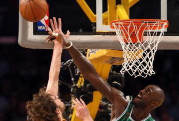 LOS ANGELES, CA - JUNE 10:  Kevin Garnett #5  of the Boston Celtics blocks the shot of Pau Gasol #16 of the Los Angeles Lakers in the first quarter of Game Three of the 2008 NBA Finals on June 10, 2008 at Staples Center in Los Angeles, California. NOTE TO USER: User expressly acknowledges and agrees that, by downloading and/or using this Photograph, user is consenting to the terms and conditions of the Getty Images License Agreement.  (Photo by Jed Jacobsohn/Getty Images)