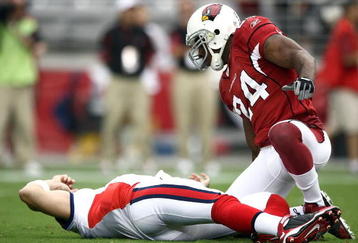 GLENDALE, AZ - OCTOBER 05: Starting Quarterback Trent Edwards #5 of the Buffalo Bills suffers a concussion after getting hit by Strong Safety Adrian Wilson #24 of the Arizona Cardinals during the first half of their NFL Game on October 5, 2008 at Stadium in Glendale, Arizona. (Photo by Donald Miralle/Getty Images)