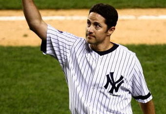 NEW YORK - SEPTEMBER 18:  Mike Mussina #35 of the New York Yankees waves to the crowd after being taken out of the game in the seventh inning against the Chicago White Sox on September 18, 2008 at Yankee Stadium in the Bronx borough of New York City.  (Photo by Chris McGrath/Getty Images)