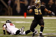 NEW ORLEANS - NOVEMBER 2:  Will Smith #91 of the New Orleans Saints celebrates sacking quarterback Matt Ryan #2 of the Atlanta Falcons during the first quarter of the game at the Louisiana Superdome on November 2, 2009 in New Orleans, Louisiana. (Photo by Chris Graythen/Getty Images)