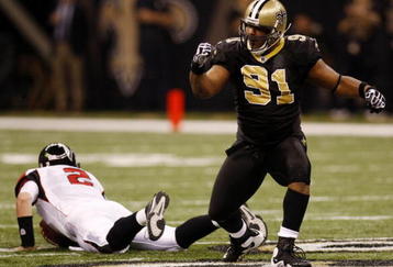 NEW ORLEANS - NOVEMBER 2:  Will Smith #91 of the New Orleans Saints celebrates sacking quarterback Matt Ryan #2 of the Atlanta Falcons during the first quarter of the game at the Louisiana Superdome on November 2, 2009 in New Orleans, Louisiana. (Photo by Chris Graythen/Getty Images)