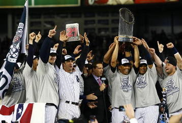 NEW YORK - NOVEMBER 04:  (L-R) A.J. Burnett #34, Jorge Posada #20, Derek Jeter #2, Mariano Rivera #42 (holding trophy) Robinson Cano #24 and Nick Swisher #33 of the New York Yankees against the Philadelphia Phillies in Game Six of the 2009 MLB World Series at Yankee Stadium on November 4, 2009 in the Bronx borough of New York City.  (Photo by Chris McGrath/Getty Images)