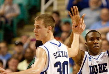 GREENSBORO, NC - MARCH 19:  Nolan Smith #2 of the Duke Blue Devils celebrates a basket with Jon Scheyer #30 and David McClure #14 against the Binghamton Bearcats during the first round of the NCAA Division I Men's Basketball Tournament at the Greensboro Coliseum on March 19, 2009 in Greensboro, North Carolina.  (Photo by Streeter Lecka/Getty Images)