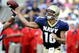 ANNAPOLIS, MD - SEPTEMBER 20: Quarterback Kaipo-Noa Kaheaku-Enhada #10 of the Navy Midshipmen sets to pass against the Rutgers Scarlet Knights at Jack Stephens Field at Navy-Marine Corps Memorial Stadium on September 20, 2008 in Annapolis, Maryland.  (Photo by Al Messerschmidt/Getty Images)