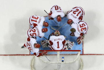 MILWAUKEE, WISCONSIN - APRIL 08:  The Wisconsin Badgers huddle before the NCAA Men's Frozen Four Championship game on April 8, 2006 at the Bradley Center in Milwaukee, Wisconsin. The Wisconsin Badgers defeated the Boston College Eagles 2-1 to win the national title.  (Photo by Elsa/Getty Images)