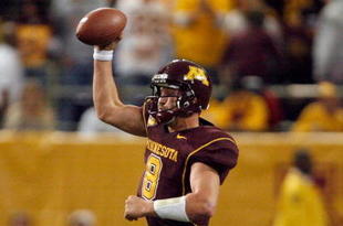 MINNEAPOLIS - NOVEMBER 01:  Adam Weber #8 of the Minnesota Golden Gophers fakes a pass down field as he scrambles out of  the pocket against the Northwestern Wildcats during the third quarter at the Hubert H.Humphrey Metrodome on November 1, 2008 in Minneapolis, Minnesota.  (Photo by Harry How/Getty Images)