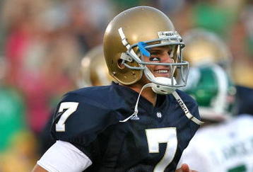 SOUTH BEND, IN - SETPEMBER 19: Jimmy Clausen #7 of the Notre Dame Fighting Irish smiles as he leaves the field after a win over the Michigan State Spartans on September 19, 2009 at Notre Dame Stadium in South Bend, Indiana. Notre Dame defeated Michigan State 33-30. (Photo by Jonathan Daniel/Getty Images)