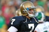 SOUTH BEND, IN - SETPEMBER 19: Jimmy Clausen #7 of the Notre Dame Fighting Irish smiles as he leaves the field after a win over the Michigan State Spartans on September 19, 2009 at Notre Dame Stadium in South Bend, Indiana. Notre Dame defeated Michigan State 33-30. (Photo by Jonathan Daniel/Getty Images)