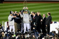 NEW YORK - NOVEMBER 04:  Andy Pettitte #46 of the New York Yankees celebrates with the trophy after their 7-3 win against the Philadelphia Phillies in Game Six of the 2009 MLB World Series at Yankee Stadium on November 4, 2009 in the Bronx borough of New York City.  (Photo by Al Bello/Getty Images)