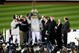 NEW YORK - NOVEMBER 04:  Andy Pettitte #46 of the New York Yankees celebrates with the trophy after their 7-3 win against the Philadelphia Phillies in Game Six of the 2009 MLB World Series at Yankee Stadium on November 4, 2009 in the Bronx borough of New York City.  (Photo by Al Bello/Getty Images)
