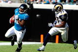 JACKSONVILLE, FL - OCTOBER 18: Maurice Jones Drew #32 of the Jacksonville Jaguars is chased by David Roach #27 of the St. Louis Rams during the game at the Jacksonville Municipal Stadium on October 18, 2009 in Jacksonville, Florida. (Photo by Sam Greenwood/Getty Images)