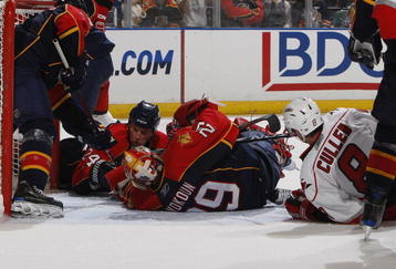 SUNRISE, FL - NOVEMBER 4: Goaltender Tomas Vokoun #29 and Bryan McCabe #24 of the Florida Panthers go to the ice to block the shot by Matt Cullen #8 of the Carolina Hurricanes in the second period on November 4, 2009 at the BankAtlantic Center in Sunrise, Florida. (Photo by Joel Auerbach/Getty Images)