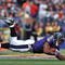 BALTIMORE - NOVEMBER 1:  Ray Rice #27 of the Baltimore Ravens runs the ball against the Denver Broncos at M&T Bank Stadium on November 1, 2009 in Baltimore, Maryland. The Ravens defeated the Broncos 30-7. (Photo by Larry French/Getty Images)