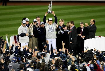 NEW YORK - NOVEMBER 04:  World Series MVP Hideki Matsui #55 of the New York Yankees celebrates with the MVP trophy after their 7-3 win against the Philadelphia Phillies in Game Six of the 2009 MLB World Series at Yankee Stadium on November 4, 2009 in the Bronx borough of New York City.  (Photo by Al Bello/Getty Images)