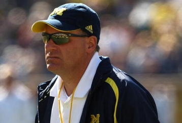 ANN ARBOR, MI - SEPTEMBER 19:  Head coach Rich Rodriguez of the Michigan Wolverines watches warmups before the game with the Eastern Michigan Eagles at Michigan Stadium on September 19, 2009 in Ann Arbor, Michigan.  Michigan won 45-17.  (Photo by Stephen Dunn/Getty Images)