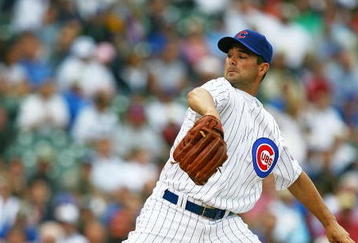 CHICAGO - AUGUST 28: Starting pitcher Ted Lilly #30 of the Chicago Cubs delivers the ball against the New York Mets on August 28, 2009 at Wrigley Field in Chicago, Illinois. The Cubs defeated the Mets 5-2.  (Photo by Jonathan Daniel/Getty Images)