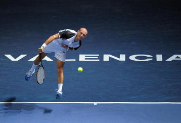 VALENCIA, SPAIN - NOVEMBER 02:  Nikolay Davydenko of Russia serves the ball in his first round match against Alejandro Falla of Colombia during the ATP 500 World Tour Valencia Open tennis tournament at the Ciudad de las Artes y las Ciencias on November 2, 2009 in Valencia, Spain. Davydenko won the match in two sets, 6-2 and 6-1.  (Photo by Jasper Juinen/Getty Images)