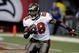 ATLANTA - DECEMBER 14: Running back Warrick Dunn #28 of the Tampa Bay Buccaneers rushes upfield against the Atlanta Falcons at the Georgia Dome on December 14, 2008 in Atlanta, Georgia.  (Photo by Al Messerschmidt/Getty Images) 