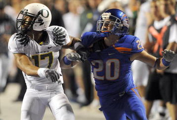BOISE, ID - SEPTEMBER 3:  Willie Glasper #17 of the Oregon Ducks battles for position with Mitch Burroughs #20 of the Boise State as a pass is thrown in second quarter of the game on September 3, 2009 at Broncos Stadium in Boise, Idaho. Boise State won the game 19-8. (Photo by Steve Dykes/Getty Images)