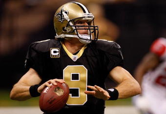 NEW ORLEANS - NOVEMBER 02:  Quarterback Drew Brees #9 of the New Orleans Saints looks to pass during the game against the Atlanta Falcons at Louisana Superdome on November 2, 2009 in New Orleans, Louisiana.  (Photo by Chris Graythen/Getty Images)