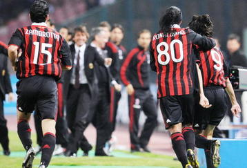 NAPLES, ITALY - OCTOBER 28:  Gianluca Zambrotta and Ronaldinho and Filippo Inzaghi of AC Milan celebrate after scoring the first goal during the Serie A match between SSC Napoli and AC Milan at Stadio San Paolo on October 28, 2009 in Rome, Italy.  (Photo by Giuseppe Bellini/Getty Images)