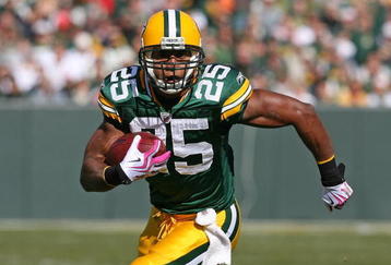 GREEN BAY, WI - OCTOBER 18: Ryan Grant #25 of the Green Bay Packers runs the ball against the Detroit Lions at Lambeau Field on October 18, 2009 in Green Bay, Wisconsin. The Packers defeated the Lions 26-0.  (Photo by Jonathan Daniel/Getty Images)