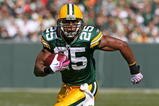 GREEN BAY, WI - OCTOBER 18: Ryan Grant #25 of the Green Bay Packers runs the ball against the Detroit Lions at Lambeau Field on October 18, 2009 in Green Bay, Wisconsin. The Packers defeated the Lions 26-0.  (Photo by Jonathan Daniel/Getty Images)