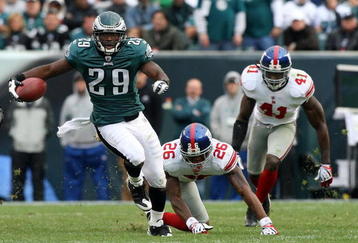 PHILADELPHIA - NOVEMBER 01:  LeSean McCoy #29 of the Philadelphia Eagles eludes the tackle attempt from Aaron Rouse #26 of the New York Giants for a long run to the endzone for a fourth quarter touchdown on November 1, 2009 at Lincoln Financial Field in Philadelphia, Pennsylvania. The Eagles defeated the Giants 40-17.  (Photo by Jim McIsaac/Getty Images)