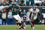 PHILADELPHIA - NOVEMBER 01:  LeSean McCoy #29 of the Philadelphia Eagles eludes the tackle attempt from Aaron Rouse #26 of the New York Giants for a long run to the endzone for a fourth quarter touchdown on November 1, 2009 at Lincoln Financial Field in Philadelphia, Pennsylvania. The Eagles defeated the Giants 40-17.  (Photo by Jim McIsaac/Getty Images)