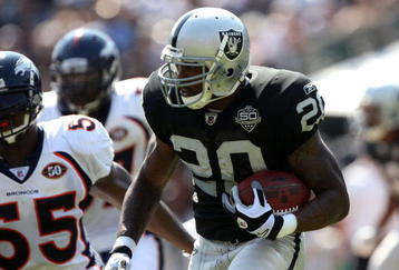 OAKLAND, CA - SEPTEMBER 27: Darren McFadden #20 of the Oakland Raiders runs against the Denver Broncos on September 27, 2009 during an NFL game at the Oakland-Alameda County Coliseum in Oakland, California.  (Photo by Jed Jacobsohn/Getty Images)
