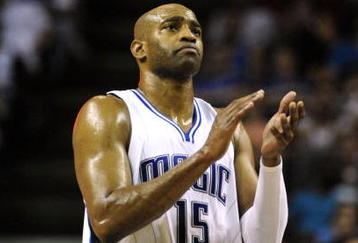 ORLANDO, FL - OCTOBER 28:  Vince Carter #15 of the Orlando Magic celebrates a play during the first half against the Philadelphia 76ers on October 28, 2009 at Amway Arena in Orlando, Florida.  NOTE TO USER: User expressly acknowledges and agrees that, by downloading and/or using this Photograph, user is consenting to the terms and conditions of the Getty Images License Agreement.  (Photo by Sam Greenwood/Getty Images)