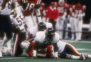 26  Jan 1986:  Quarterback Tony Eason #11 of the New England Patriots is brought down by linebacker Wilber Marshall #58 of the Chicago Bears during Super Bowl XX  game at the Louisiana Superdome in New Orleans, Louisiana.  The Bears won the game 46-10.