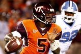 BLACKSBURG, VA - OCTOBER 29:  Quarterback Tyrod Taylor #5 of the Virginia Tech University Hokies looks to pass the ball against E.J. Wilson #92 of the North Carolina Tar Heels during the first quarter of the game at Lane Stadium on October 29, 2009 in Blacksburg, Virginia.  (Photo by Scott Halleran/Getty Images)