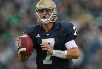 SOUTH BEND, IN - OCTOBER 03: Jimmy Clausen #7 of the Notre Dame Fighting Irish looks for a receiver against the Washington Huskies on October 3, 2009 at Notre Dame Stadium in South Bend, Indiana. Notre Dame defeated Washington 37-30 in overtime. (Photo by Jonathan Daniel/Getty Images)