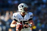SAN DIEGO - OCTOBER 17: Max Hall #15 of BYU Cougars looks to pass the ball to teamate while playing against San Diego State Aztecs at Qualcomm Stadium on October 17, 2009 in San Diego, California.  (Photo by Jacob de Golish/Getty Images)