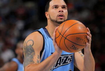DENVER - OCTOBER 28:  Deron Williams #8 of the Utah Jazz takes a free throw against the Denver Nuggets during NBA action at Pepsi Center on October 28, 2009 in Denver, Colorado. The Nuggets defeated the Jazz 114-105.  (Photo by Doug Pensinger/Getty Images)