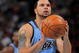 DENVER - OCTOBER 28:  Deron Williams #8 of the Utah Jazz takes a free throw against the Denver Nuggets during NBA action at Pepsi Center on October 28, 2009 in Denver, Colorado. The Nuggets defeated the Jazz 114-105.  (Photo by Doug Pensinger/Getty Images)