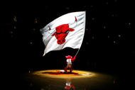 CHICAGO - DECEMBER 09: Benny the Bull, mascot for the Chicago Bulls, waves a giant flag with the Bulls' logo on it during pregame festivities against the New York Knicks at the United Center on December 9, 2008 in Chicago, Illinois. NOTE TO USER: User expressly acknowledges and agrees that, by downloading and/or using this Photograph, user is consenting to the terms and conditions of the Getty Images License Agreement. (Photo by Jonathan Daniel/Getty Images)