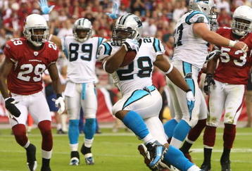 GLENDALE, AZ - NOVEMBER 01:  Running back Jonathan Stewart #28 of the Carolina Panthers scores a 6 yard rushing touchdown past Dominique Rodgers-Cromartie #28 of the Arizona Cardinals during the first quarter of the NFL game at the Universtity of Phoenix Stadium on November 1, 2009 in Glendale, Arizona.  (Photo by Christian Petersen/Getty Images)